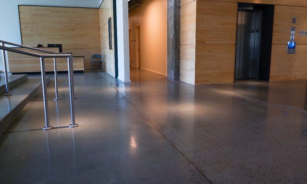 A concrete floor with control joints in an office building. 