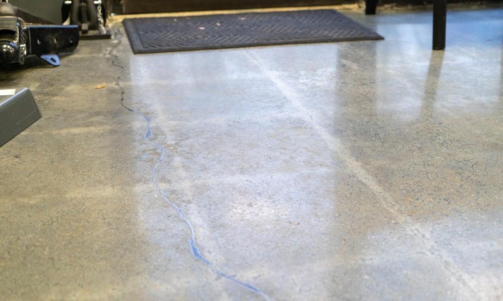 Stress cracks in a concrete floor. 