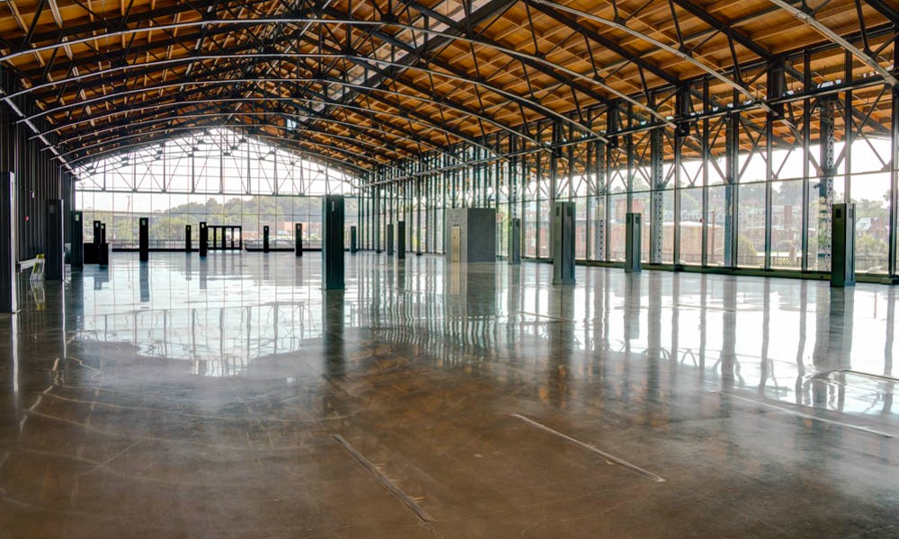 A polished concrete floor with some joints visible.