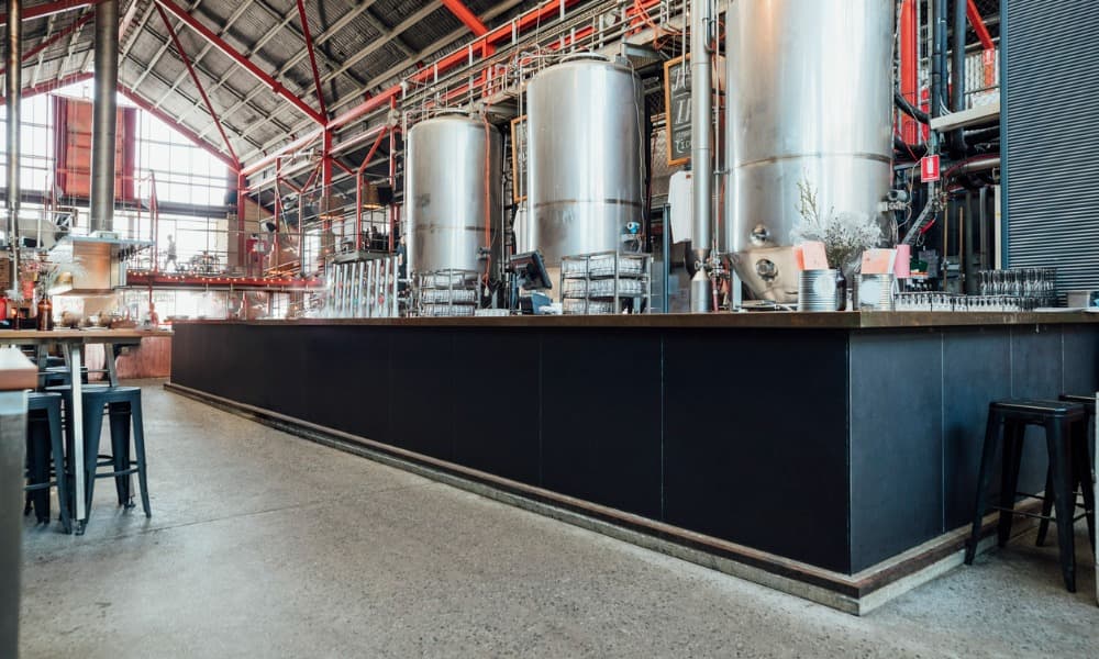 A facility with concrete brewery floors.