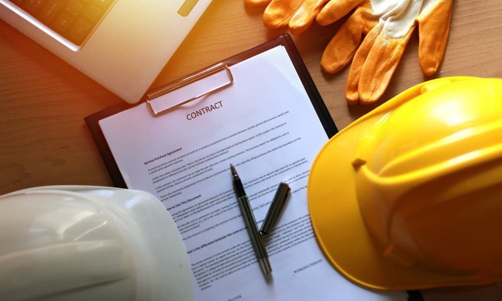 Having a written contract is essential when hiring concrete contractors. 