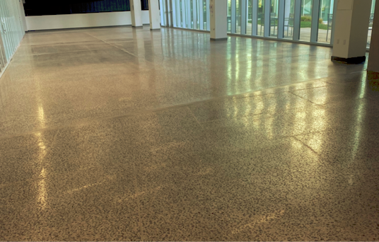 Exposed aggregate floor in the Moss Theater's front lobby